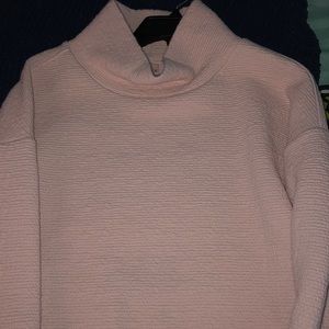 Thick turtleneck sweater.